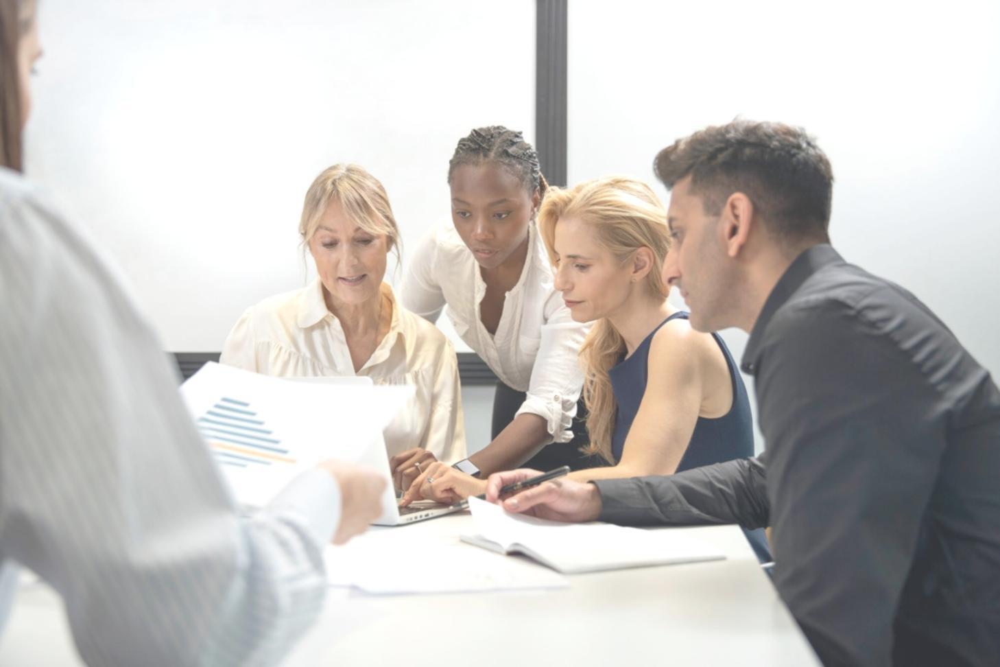 Professional reviewing brand messaging documentation and content examples